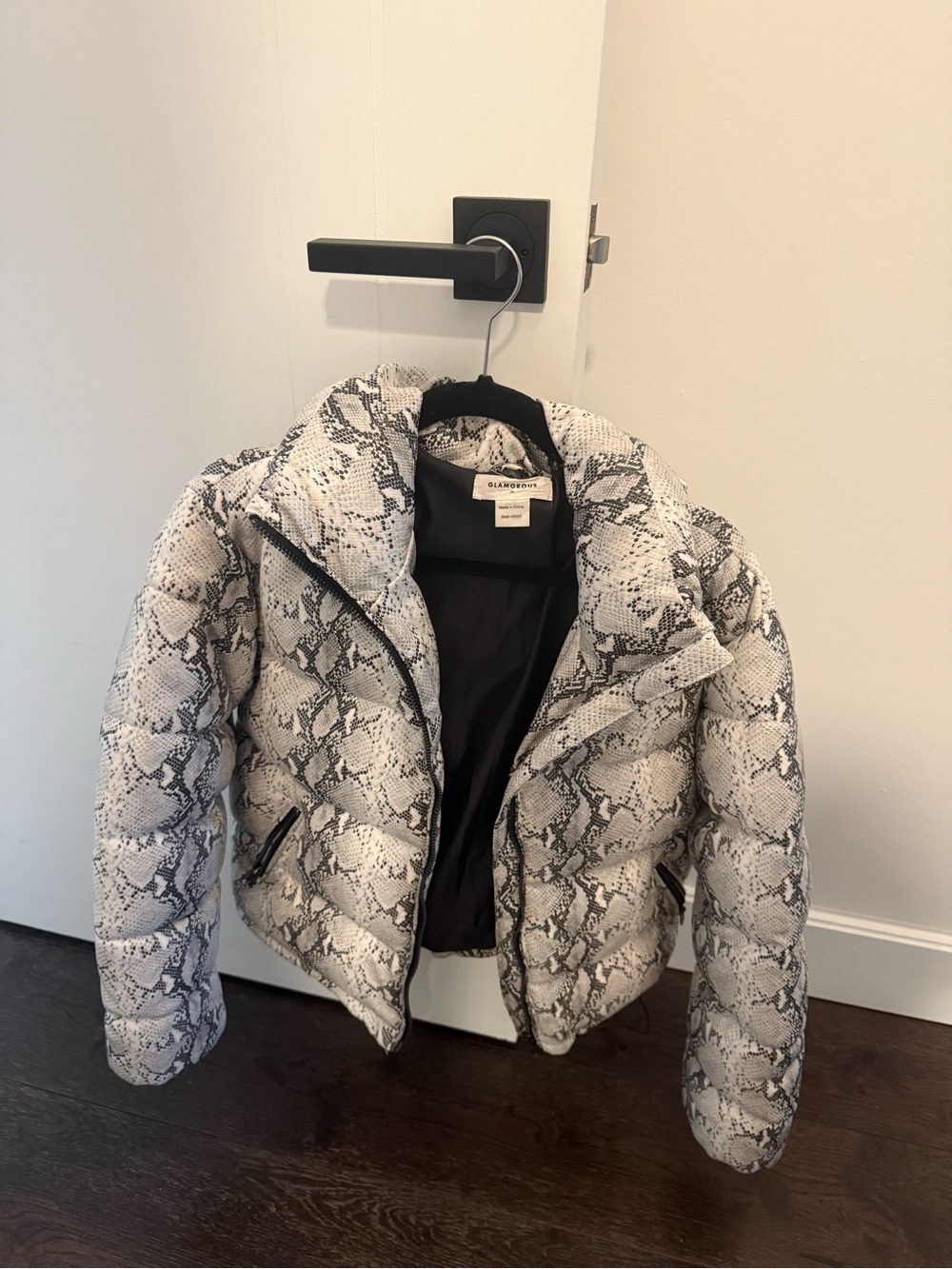 Insulated puffer jacket with adjustable waist